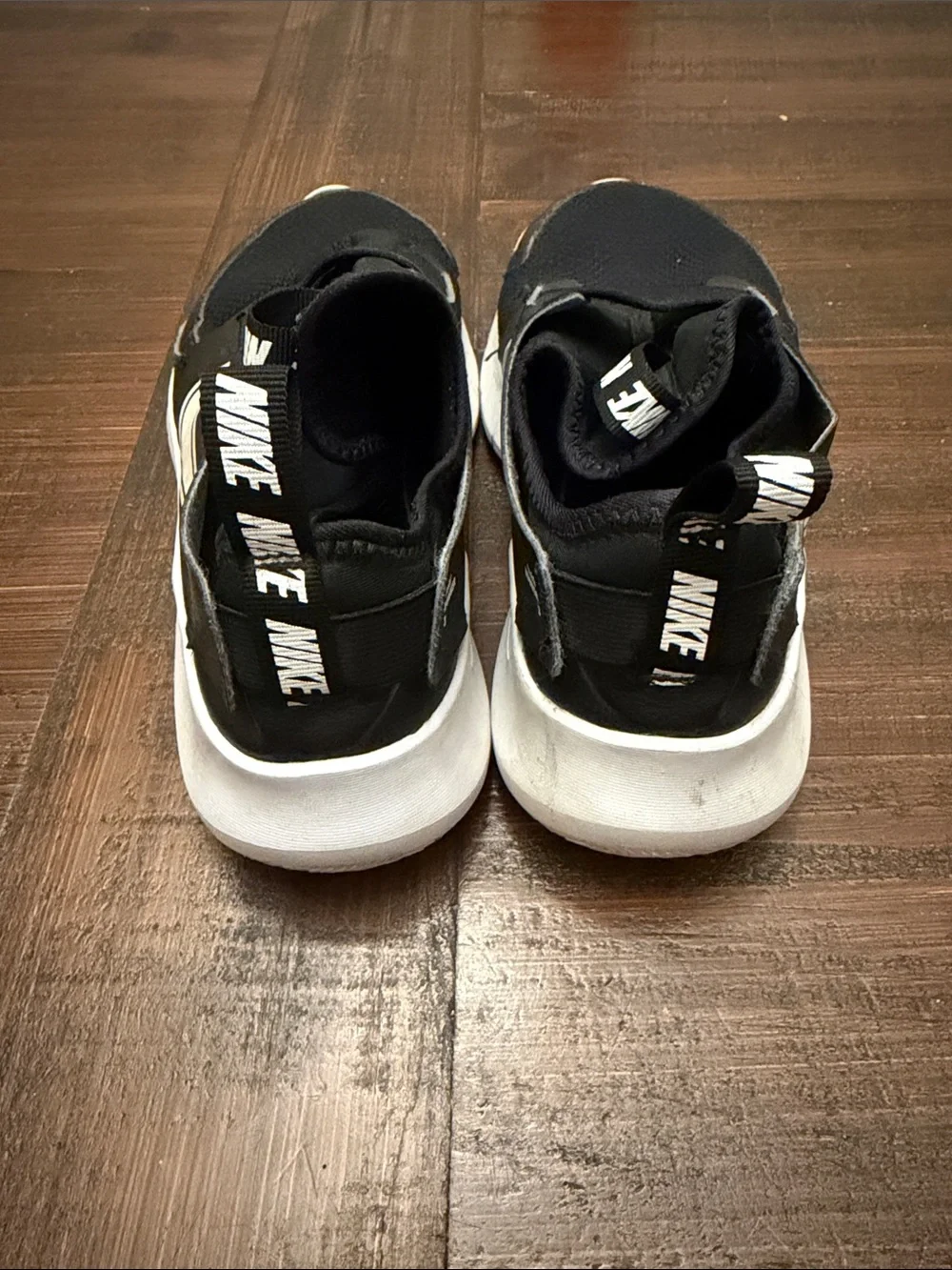 Nike Kids Black and White Slip-On Sneakers